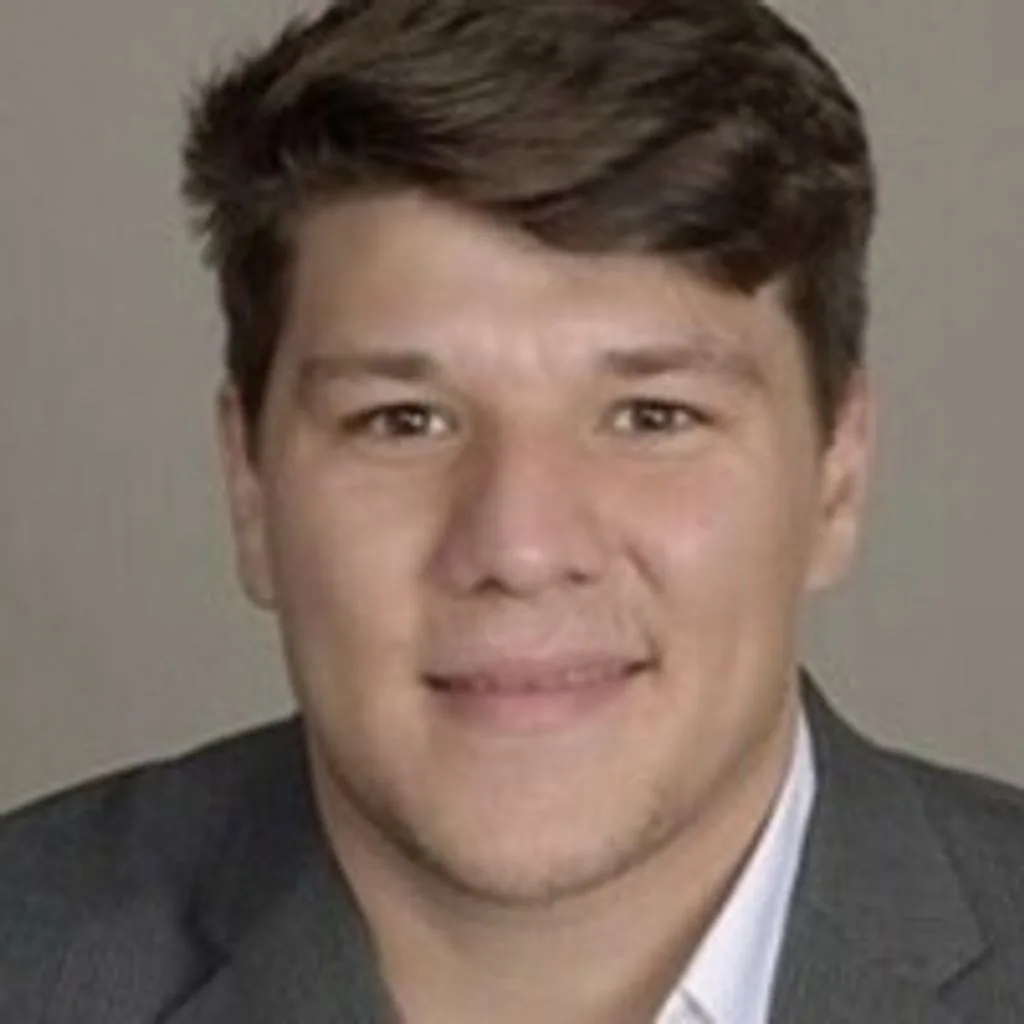 Portrait of Dennis Lee Deneui